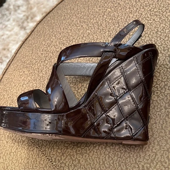 Valentino wedges in an eggplant color size 6 1/2 amazing condition